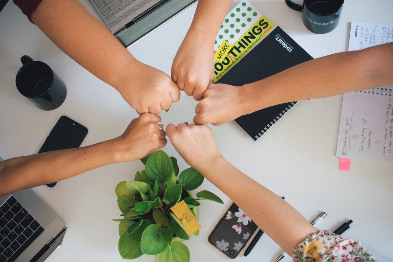 group-fist-bump